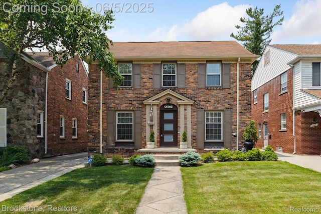 20171 Renfrew Rd, Detroit, MI 48221 - view of front of house with brick siding and a front lawn