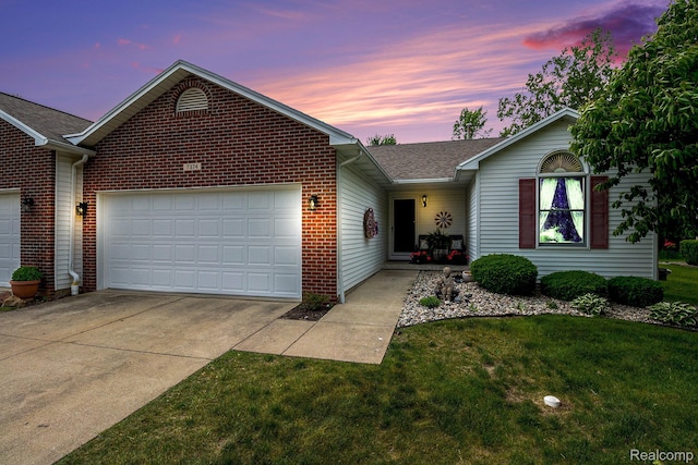 7374 Cross Creek Dr, Swartz Creek, MI 48473 - ranch-style house with a garage, concrete driveway, a front yard, a shingled roof, and brick siding
