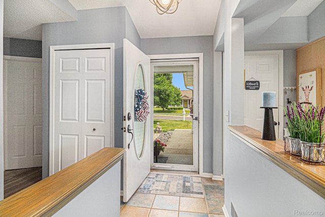 7374 Cross Creek Dr, Swartz Creek, MI 48473 - entrance foyer featuring light tile patterned floors and baseboards