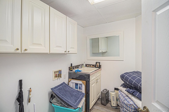 7374 Cross Creek Dr, Swartz Creek, MI 48473 - laundry area with cabinet space, washer hookup, and light wood-style floors