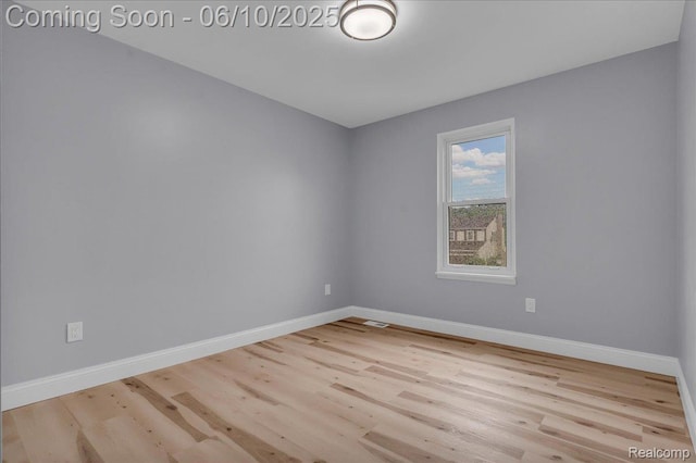 2148 E Roundtable Dr, Canton, MI 48188 - unfurnished room with wood finished floors and baseboards