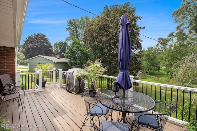 38 Meadowview Dr, Howell, MI 48843 - wooden deck featuring a grill