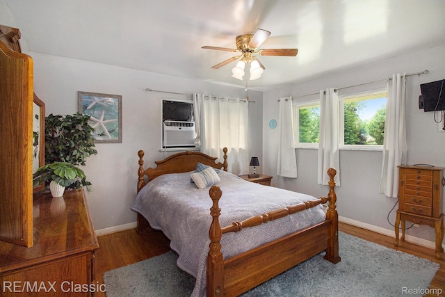 38 Meadowview Dr, Howell, MI 48843 - bedroom featuring wood finished floors, baseboards, cooling unit, and ceiling fan