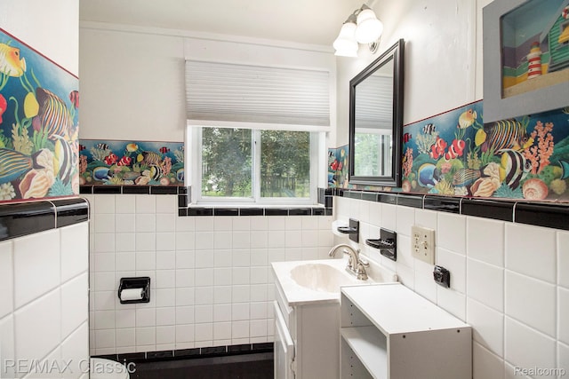 38 Meadowview Dr, Howell, MI 48843 - bathroom featuring vanity, tile walls, and a wainscoted wall