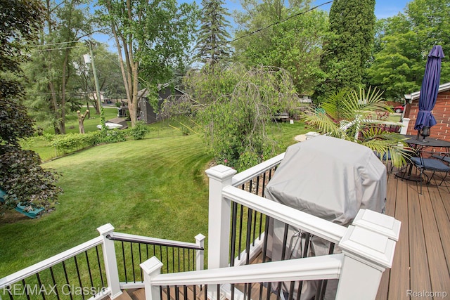 38 Meadowview Dr, Howell, MI 48843 - wooden terrace with a lawn and view of scattered trees