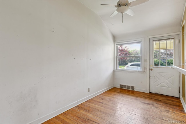 3417 Edgewood Dr, Ann Arbor, MI 48104 - spare room with light wood-type flooring, baseboards, ceiling fan, and vaulted ceiling