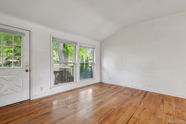 3417 Edgewood Dr, Ann Arbor, MI 48104 - unfurnished room featuring lofted ceiling and wood-type flooring