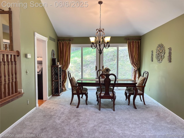 5005 Mohawk Ave, Clarkston, MI 48348 - dining space featuring a chandelier, carpet floors, baseboards, and lofted ceiling