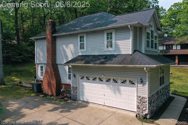 5005 Mohawk Ave, Clarkston, MI 48348 - view of front of house with stone siding, a chimney, and a shingled roof