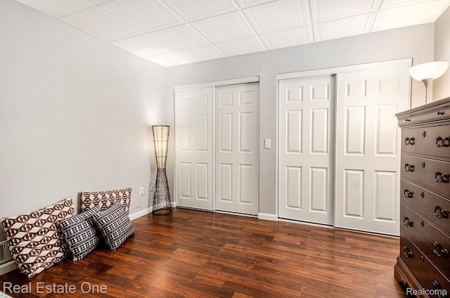2400 Rolandale, West Bloomfield, MI 48324 - bedroom with two closets, dark wood-style floors, and baseboards