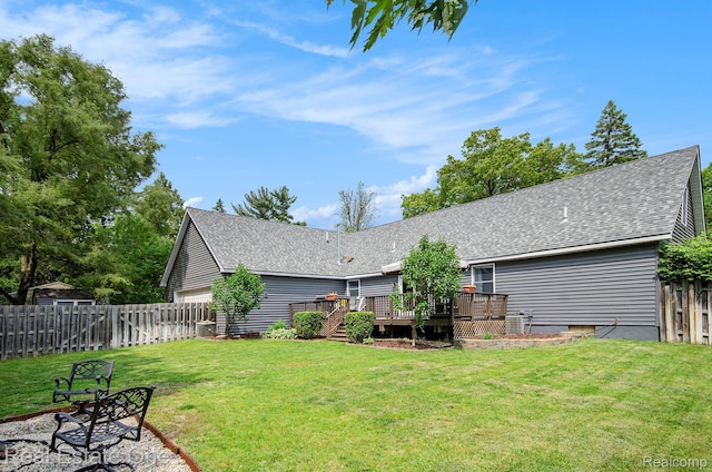 2400 Rolandale, West Bloomfield, MI 48324 - rear view of house featuring a deck, roof with shingles, and a garage