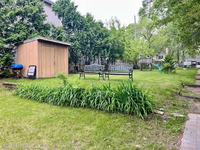 2400 Rolandale, West Bloomfield, MI 48324 - view of grassy yard featuring a playground