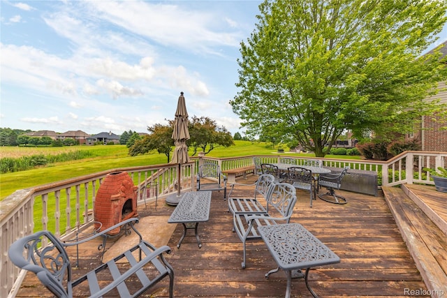 2401 Spyglass Dr, Oakland, MI 48363 - wooden deck with a yard and outdoor dining area