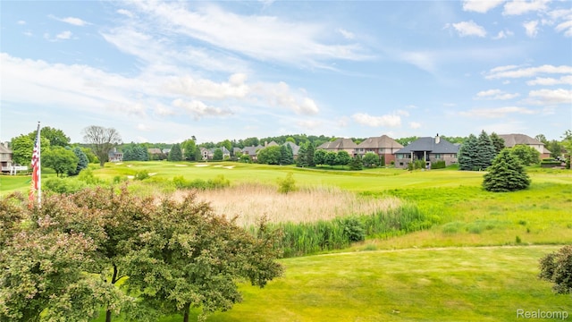 2401 Spyglass Dr, Oakland, MI 48363 - view of grassy yard featuring view of golf course and a residential view