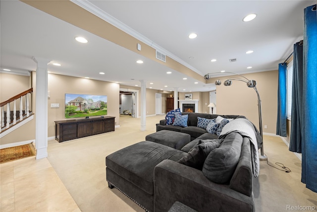2401 Spyglass Dr, Oakland, MI 48363 - living area featuring decorative columns, light colored carpet, crown molding, recessed lighting, and stairs