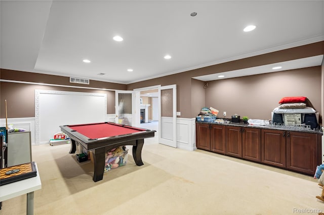 2401 Spyglass Dr, Oakland, MI 48363 - recreation room with ornamental molding, billiards, wainscoting, light carpet, and a decorative wall