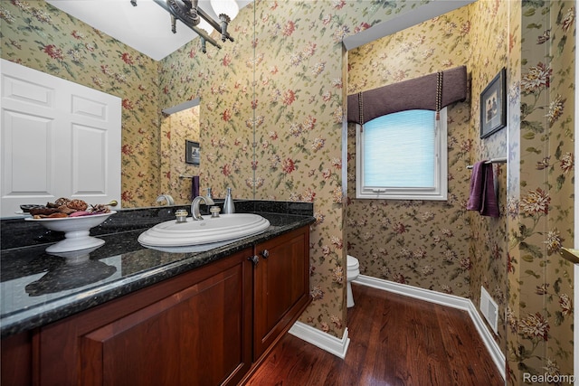 2401 Spyglass Dr, Oakland, MI 48363 - bathroom with wood finished floors and vanity