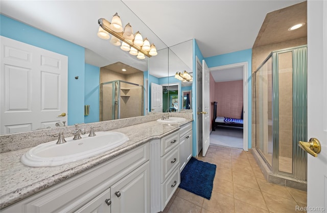 2401 Spyglass Dr, Oakland, MI 48363 - bathroom with double vanity, a stall shower, tile patterned flooring, and ensuite bathroom