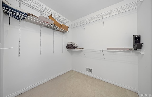 2401 Spyglass Dr, Oakland, MI 48363 - spacious closet featuring light carpet