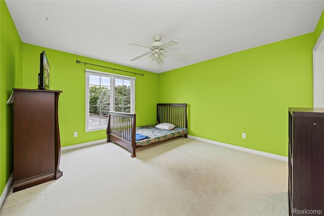 2401 Spyglass Dr, Oakland, MI 48363 - unfurnished bedroom featuring carpet floors and a ceiling fan