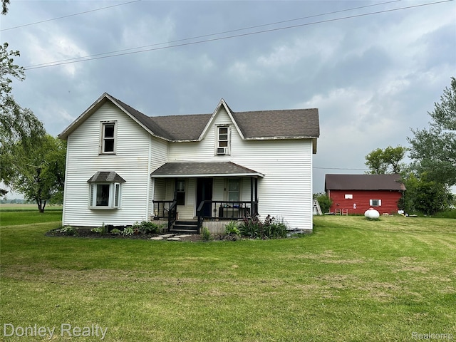 1286 Elmer Rd, Sandusky, MI 48471 - traditional home featuring covered porch, a shingled roof, and a front yard