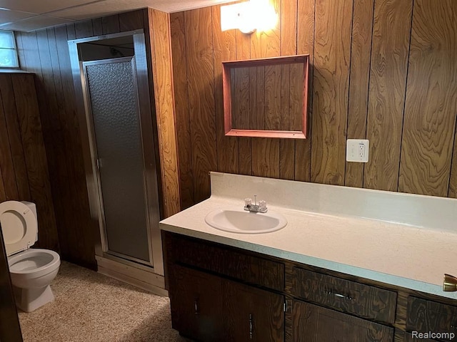 2763 Ranieri Dr, Troy, MI 48085 - bathroom with wood walls, a stall shower, and vanity