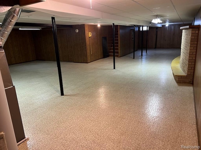 2763 Ranieri Dr, Troy, MI 48085 - finished basement featuring wood walls, a drop ceiling, and light flooring