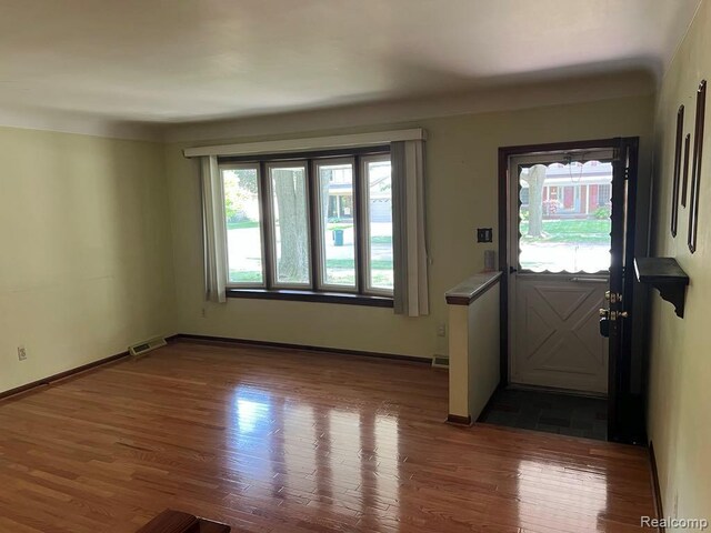 2763 Ranieri Dr, Troy, MI 48085 - foyer entrance featuring wood finished floors and baseboards