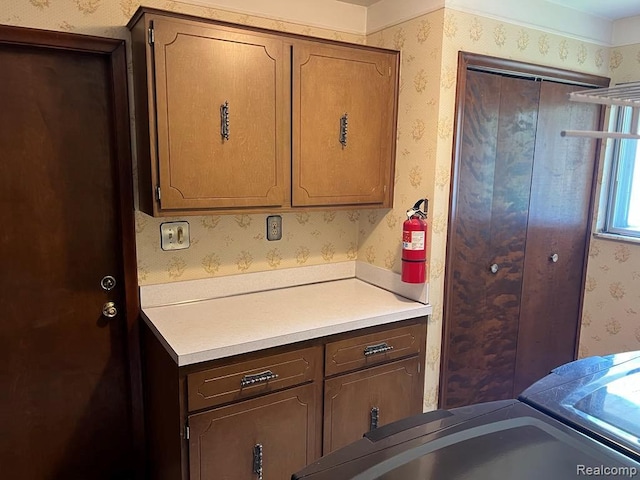 2763 Ranieri Dr, Troy, MI 48085 - kitchen featuring wallpapered walls and light countertops
