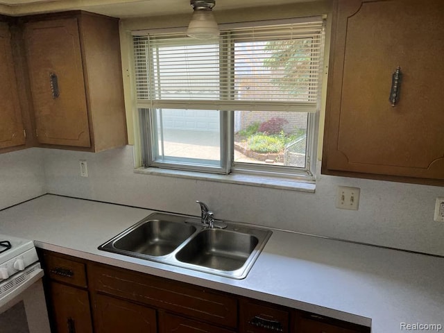 2763 Ranieri Dr, Troy, MI 48085 - kitchen with light countertops and white stove