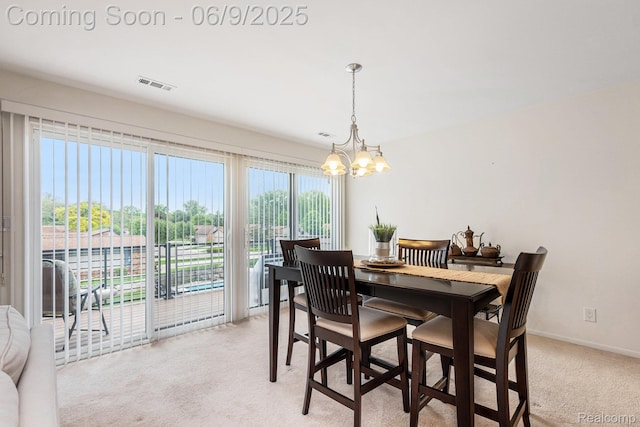 4483 Laurel Club Cir W, Bloomfield, MI 48323 - dining space with light carpet, a chandelier, and baseboards