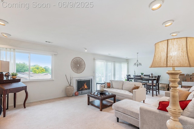 4483 Laurel Club Cir W, Bloomfield, MI 48323 - living room featuring carpet, a warm lit fireplace, baseboards, and recessed lighting