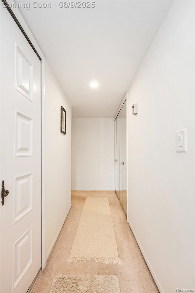 4483 Laurel Club Cir W, Bloomfield, MI 48323 - corridor featuring light carpet and baseboards