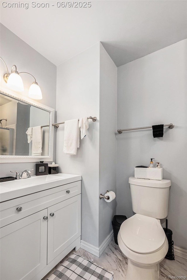 4483 Laurel Club Cir W, Bloomfield, MI 48323 - bathroom with toilet, vanity, and baseboards