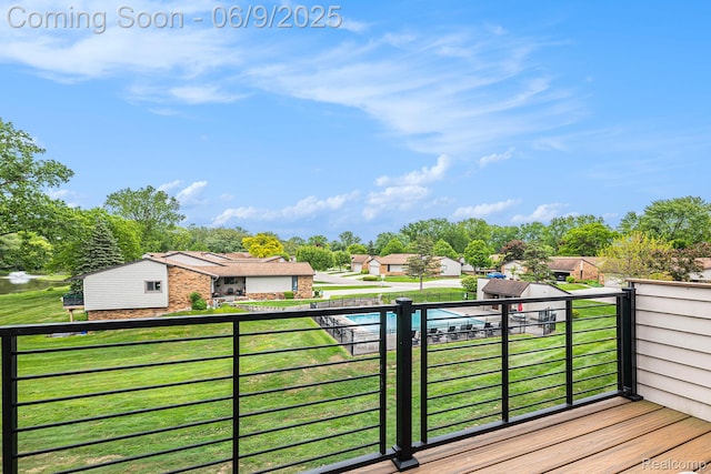 4483 Laurel Club Cir W, Bloomfield, MI 48323 - wooden deck with a residential view, a yard, and view of scattered trees
