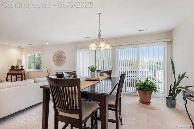4483 Laurel Club Cir W, Bloomfield, MI 48323 - dining space with light carpet, a chandelier, and baseboards