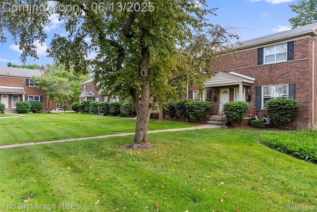 3344 Coolidge Hwy, Royal Oak, MI 48073 - view of front facade featuring brick siding and a front yard