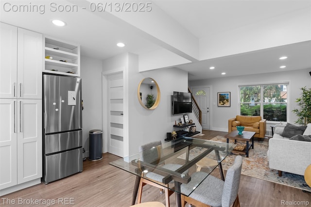 3344 Coolidge Hwy, Royal Oak, MI 48073 - dining space featuring light wood-style flooring, stairway, and recessed lighting