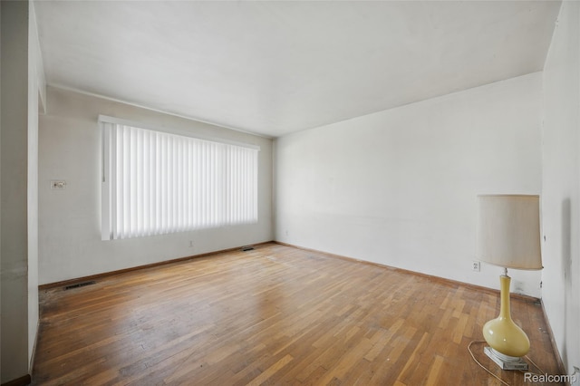 13332 Masonic Blvd, Warren, MI 48088 - empty room with hardwood / wood-style flooring and baseboards