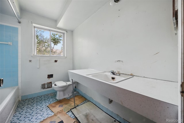 13332 Masonic Blvd, Warren, MI 48088 - full bath with toilet, a sink, tile patterned floors, and shower / washtub combination