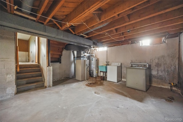 13332 Masonic Blvd, Warren, MI 48088 - unfinished basement featuring gas water heater, separate washer and dryer, stairs, heating unit, and a sink