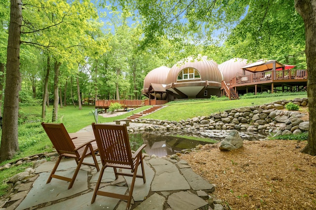 2755 N 9th St, Kalamazoo, MI 49009 - view of grassy yard with a deck, a patio area, and stairs