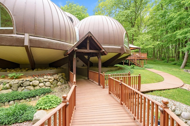 2755 N 9th St, Kalamazoo, MI 49009 - view of home's community featuring a wooden deck and a lawn