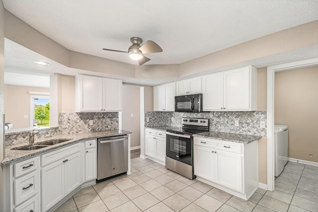 1599 Weatherstone Dr Unit 245, Ann Arbor, MI 48108 - kitchen featuring appliances with stainless steel finishes, a sink, a ceiling fan, white cabinets, and recessed lighting