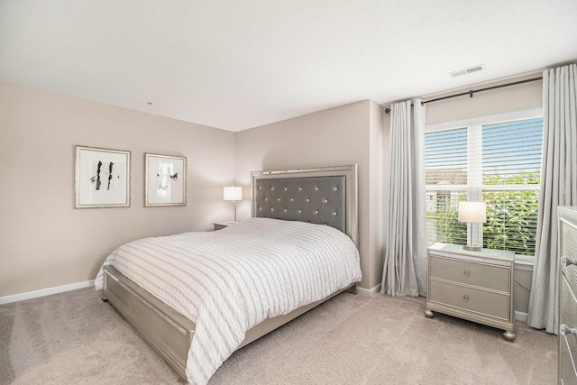 1599 Weatherstone Dr Unit 245, Ann Arbor, MI 48108 - bedroom with light colored carpet and baseboards