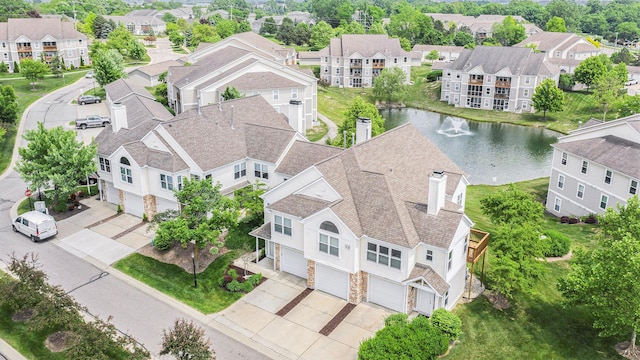 1599 Weatherstone Dr Unit 245, Ann Arbor, MI 48108 - aerial perspective of suburban area featuring a nearby body of water