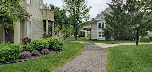 1599 Weatherstone Dr Unit 245, Ann Arbor, MI 48108 - surrounding community featuring a lawn