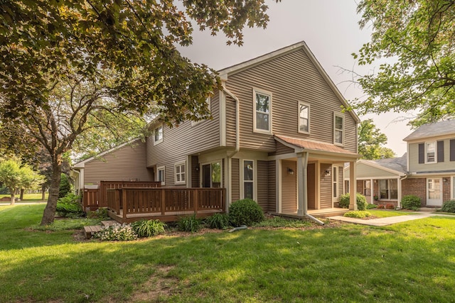 2705 Winthrop Ct, Ann Arbor, MI 48104 - back of property featuring a yard and a deck