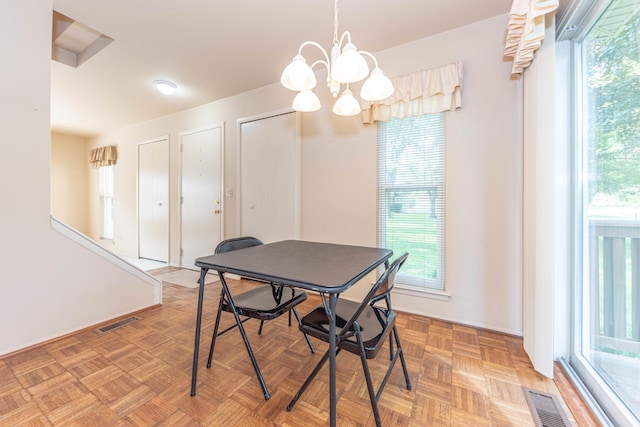 2705 Winthrop Ct, Ann Arbor, MI 48104 - dining space with a chandelier