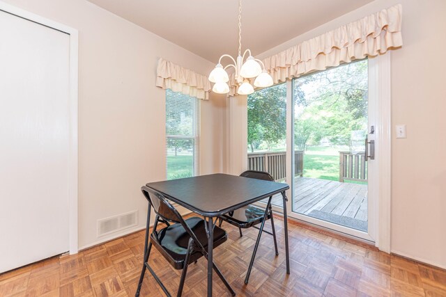 2705 Winthrop Ct, Ann Arbor, MI 48104 - dining room with a chandelier and baseboards